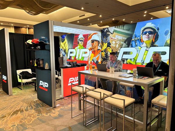 PIP Canada - Trade show booth with branded fabric backdrop